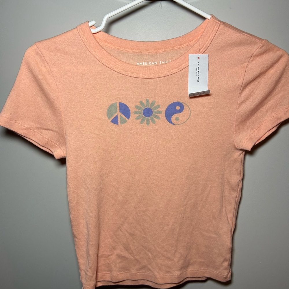 NWT American Eagle Outfitters Coral Symbol Tee